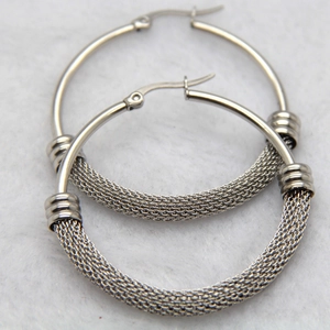 Close-up of 316L stainless steel hoop earrings with woven mesh texture detail