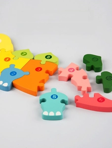 Detailed view of colorful large wooden puzzle pieces with numbers for early math learning