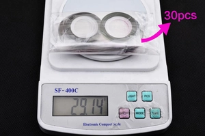 Detailed scale view of 30pcs nail striping tape rolls set weighing 29.14g in package