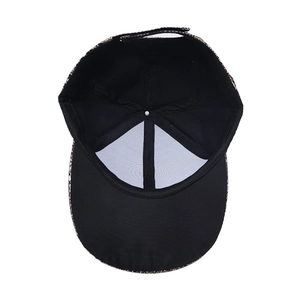 Detailed interior of leopard print baseball cap with reinforced stitching and adjustable strap