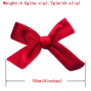 Red velvet knotted bow hair clip 10cm width shown on white background with weight specs