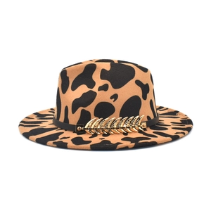 Classic wide brim jazz fedora hat with brown leopard print and gold feather accessory