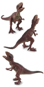 Detalle macro de un modelo de dinosaurio marrón rojizo con textura de piel realista y boca abierta