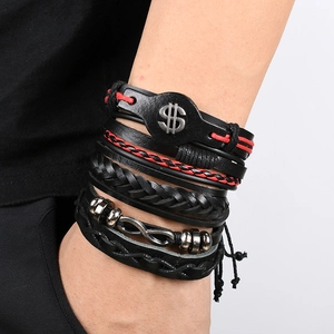 Detail of multi-layer men's leather bracelets with dollar and infinity metal charms