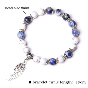 Detail view showing 8mm blue marble beads with rose wing charm and size specifications