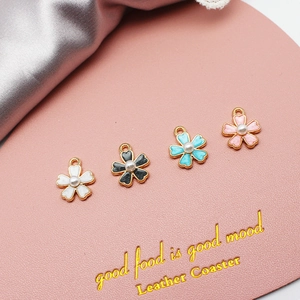 DIY gold alloy flower pendants with enamel and pearl centers in four assorted colors