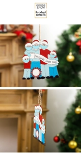 Detail of wooden 5-person family Christmas ornament with masks and stay home banner