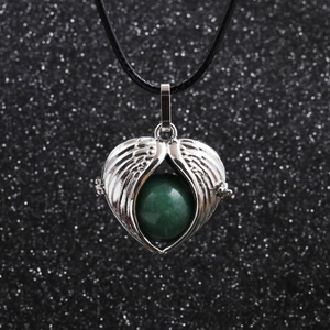 Silver angel wing heart necklace with green gemstone on a black wax cord for women