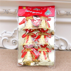 Detail of 6 pack gold Christmas bells with red bows and Merry Christmas labels