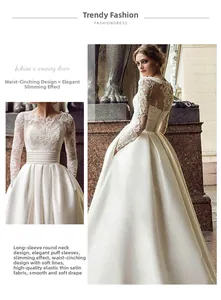 Close-up of lace embroidery on white long-sleeved satin bridal gown with side-back view