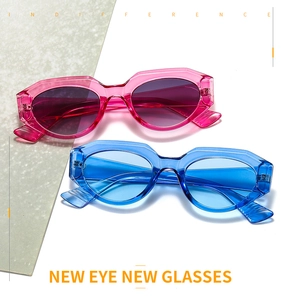 Detail view of colorful geometric rimless sunglasses in transparent rose and blue finishes