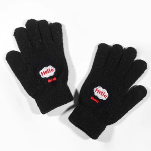 Close-up of black knit gloves with red Hello embroidery and elastic ribbed cuffs