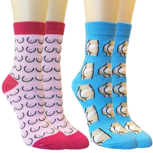 Detail view of cotton crew socks featuring blue butt and pink breast cartoon patterns