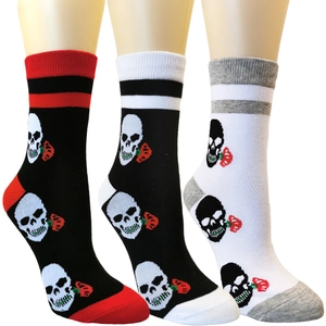 Trois paires de chaussettes d'Halloween avec motifs de crânes et roses assorties