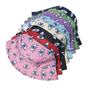 Wide brim bucket hats with embroidered eye patterns in various vibrant colors