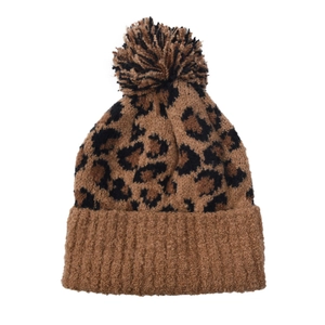 Women's winter leopard print knitted beanie with a fluffy faux fur pom pom