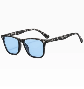 Detail of square frame sunglasses with blue lenses and marbled temples with metal rivets