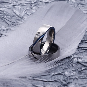 Brushed stainless steel couple rings with blue diagonal groove and set zircon stones