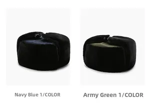 Detail of navy blue and army green winter trapper hats with thick faux fur ear flaps