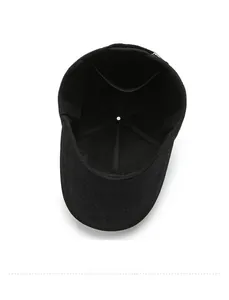 Detail view of the black cotton baseball cap interior showing lining and stitching