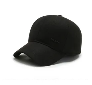Side view of black wool winter baseball cap with plush lining and sport embroidery