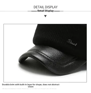 Details einer Winter-Baseballkappe mit Lederschirm und Sport-Logo aus Metall