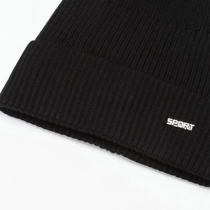 Winter black knitted beanie with warm fleece lining and sport metal logo plate