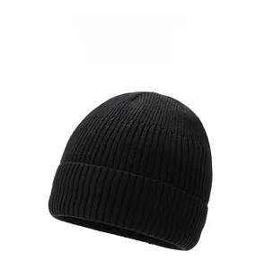 Detailed view of black ribbed knit beanie featuring white SPORT embroidery and thick texture