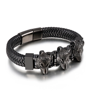 Bracciale punk da uomo in pelle nera intrecciata con tre teste di lupo e chiusura magnetica