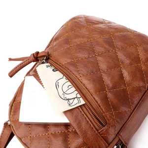 Brown quilted leather crossbody bag with vintage embroidery and multi-layer storage