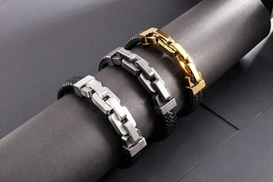 Three rows of braided leather bracelets with gold, steel and vintage silver metal clasps