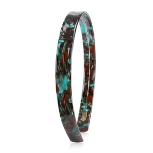 Detail showing the tortoiseshell pattern and texture on a 1.5cm acetate headband