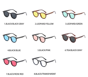Detailed grid of vintage round sunglasses in eight assorted colors and frame textures