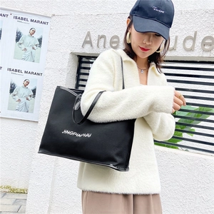 Large black canvas tote bag for women, stylish shoulder handbag for daily commuting