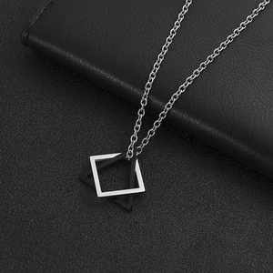 Men's geometric necklace with interlocking silver and black square pendants in titanium steel