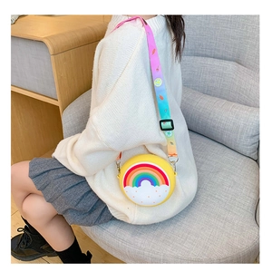 Detail of yellow silicone rainbow crossbody bag for kids with adjustable printed strap