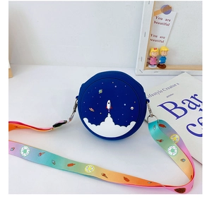 Detail of round silicone space rocket bag with colorful gradient rainbow shoulder strap