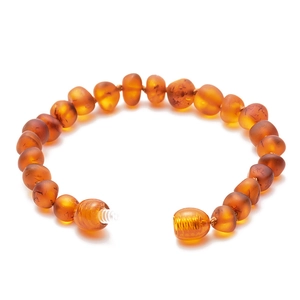 Natural Baltic amber baby bracelet with irregular beads and a secure screw clasp