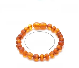 Detail view of 15cm Baltic amber baby bracelet showing 3.17g weight and matte beads