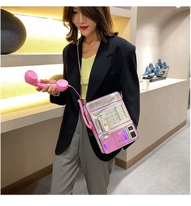 Sac bandoulière rétro en forme de téléphone rose holographique avec cadran rotatif