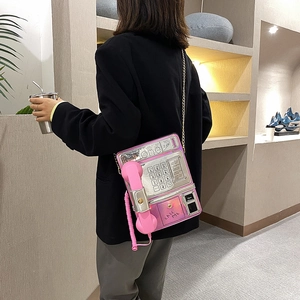 Bolso de hombro creativo en forma de teléfono para mujer, bolso metálico rosa y plateado.