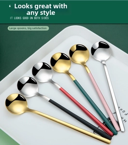 Close-up of multicolor 304 stainless steel coffee spoons with mirror finish on a tray