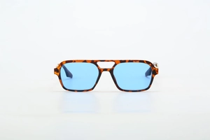 Detail of tortoise shell frame sunglasses with double bridge and light blue lenses