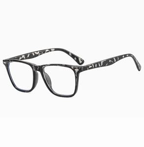 Macro view of rectangular marble texture glasses frame with silver metal rivets details