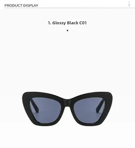 Detailed view of glossy black cat-eye sunglasses with dark blue lenses and chic frames