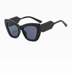 Detailed side view of black cat-eye sunglasses with wide geometric temples and dark lenses