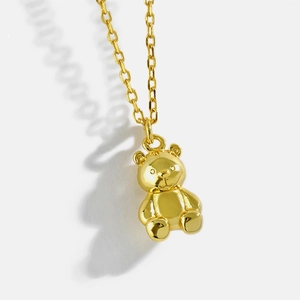 Chic 3D teddy bear pendant necklace in golden finish with minimalist chain for women