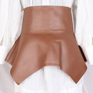 Deep brown faux leather wide waist corset belt with ruffled hem on a white top