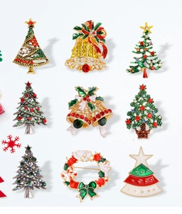 Detailed grid of Christmas brooches with tree, bell, and wreath designs in colorful enamel