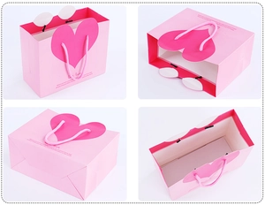 Detail view of pink heart gift bag showing front design, bottom, and inner structure